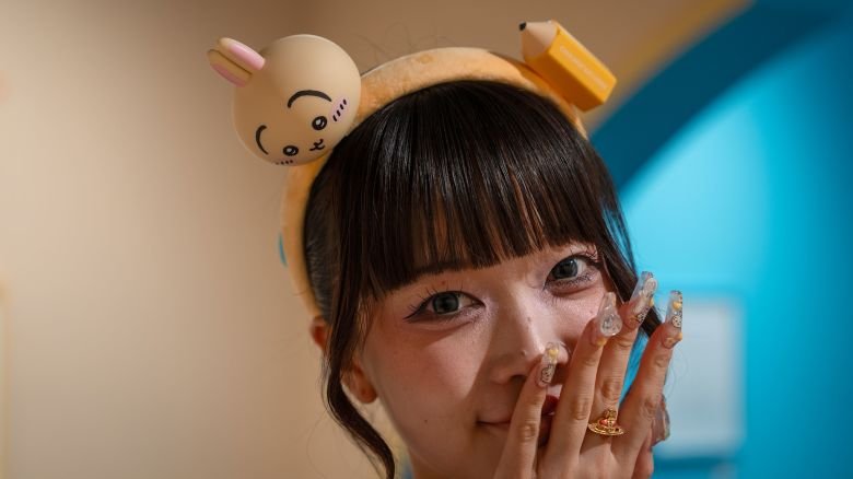 A visitor poses for a picture while attending the Chiikawa Artiverse exhibition at K11 MUSEA in Hong Kong on September 3, 2026.