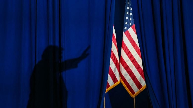 President Donald Trump casts a shadow while leaving a campaign rally in Durant, Oklahoma on October 1.