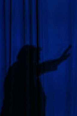 President Donald Trump casts a shadow while leaving a campaign rally in Durant, Oklahoma on October 1.