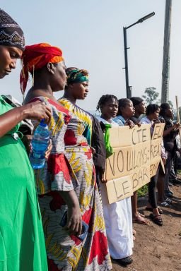 Healthcare workers demonstrate outside the Elikya Ebola Treatment Center, demanding payment of two months' overdue benefits, following a visit by Democratic Republic of Congo Prime Minister Judith Suminwa Tuluka, in Bunia, on July 25, 2026.