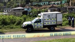 A forensic vehicle is parked near the scene where several people were killed and several others injured, in the township of KwaMakhutha near Durban, South Africa, on September 23, 2026.