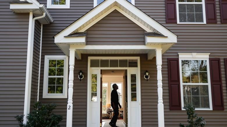 In this July 21, 2020, file photo, a homeowner tours their new home, in Washingtonville, N.Y.
