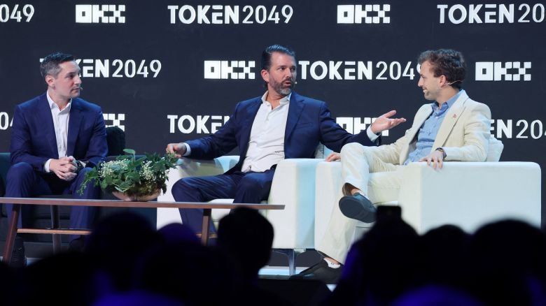 World Liberty co-founder Donald Trump Jr. speaks with CEO Zach Witkoff and Founder and Chief Executive of Wachsman David Wachsman at the TOKEN2049 crypto conference in Singapore October 1, 2025. REUTERS/Edgar Su