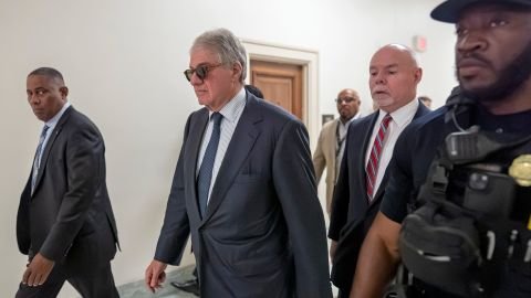 Leon Black, center and in sunglasses, arrives for a closed-door interview with the House Oversight Committee at the US Capitol on June 26.