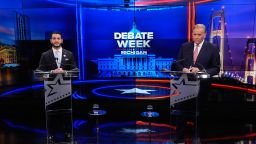 Democratic nominee for US Senate Abdul El-Sayed, left, appears with Republican nominee for US Senate Mike Rogers during a televised debate at WOOD-TV, on Thursday, in Grand Rapids, Michigan.
