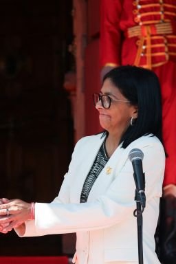 U.S. Energy Secretary Chris Wright and Venezuelan acting President Delcy Rodriguez shake hands as they attend a press conference following the signing of an agreement between U.S. oil major Chevron and government officials to expand the company's operations, at Miraflores Palace in Caracas, Venezuela, September 2, 2026.