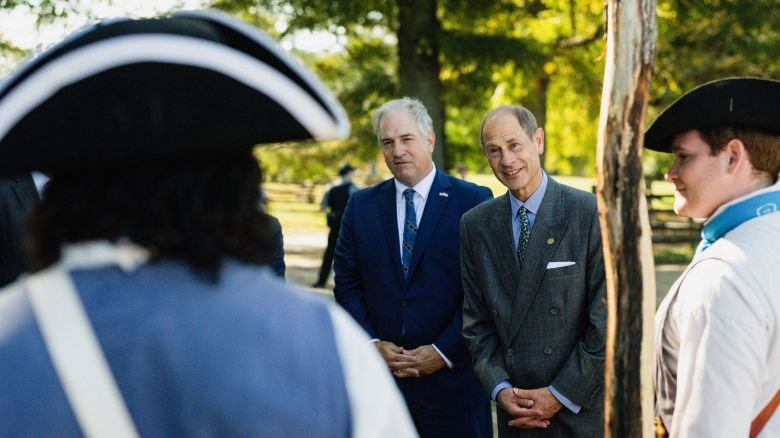 Douglas Bradburn, Director of George Washington's Mount Vernon, alongside Britain's Prince Edward, Duke of Edinburgh, talks to Revolutionary era re-enactors during a tour of Mount Vernon, the estate of the first US President, George Washington, in Mount Vernon, Virginia, US, October 1, 2026.