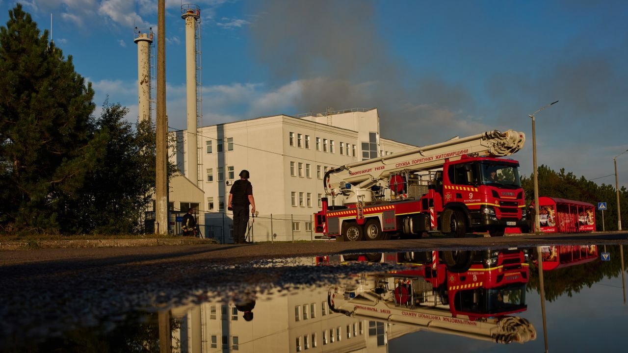 Smoke rises from a damaged Coca Cola factory after a Russian drone attack in Brovary, outskirts of Kyiv, Ukraine, Thursday, Sept. 3, 2026.