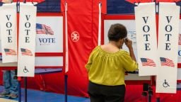 A voter casts their ballot at a polling location inside Beebe Public School during a primary election in Malden, Massachusetts, US, on Tuesday, September 1.