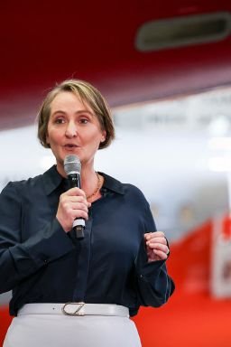 Qantas Airways CEO Vanessa Hudson announces half-yearly earnings in an aircraft hanger at Sydney's Kingsford Smith airport in February 2024.