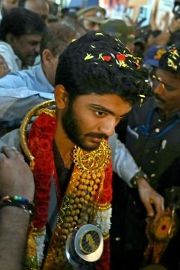 Gukesh Dommaraju is welcomed home upon his arrival at the Chennai International Airport on December 16 after his win at the FIDE World Chess Championship in Singapore.