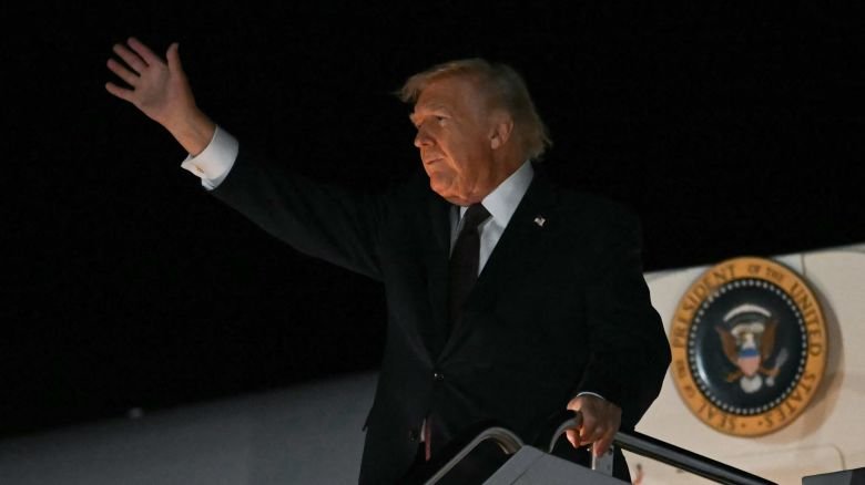 President Donald Trump steps off Air Force On at Rocky Mount Wilson Regional Airport in Elm City, North Carolina, on December 19, 2025.