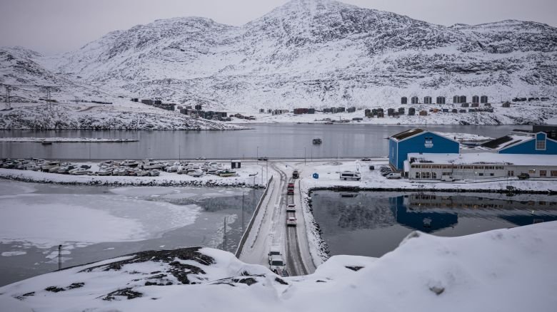 Traffic moves along a narrow road as vehicles exit the Sullorsuaq tunnel in Nuuk, Greenland, on January 21, 2026.
