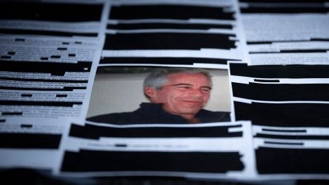 This photo illustration shows redacted documents from the Epstein Library files released by the US Department of Justice in Washington, DC, on February 18.
