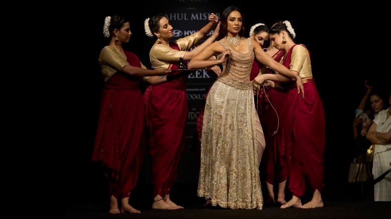 Sobhita Dhulipala (C) walks the runway during the Rahul Mishra show at India Couture Week 2026 on July 29, 2026 in Delhi, India.