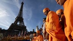 Bochasanwasi Akshar Purushottam Swaminarayan Sanstha (BAPS) Hindu monks take part in a religious ceremony in front of the Eiffel Tower in Paris on September 2, 2026.