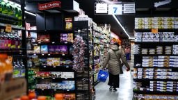 A customer walks down the aisle in a supermarket in the Sugar Hill neighborhood of Manhattan in New York on September 28, 2026. (Photo by CHARLY TRIBALLEAU / AFP via Getty Images)