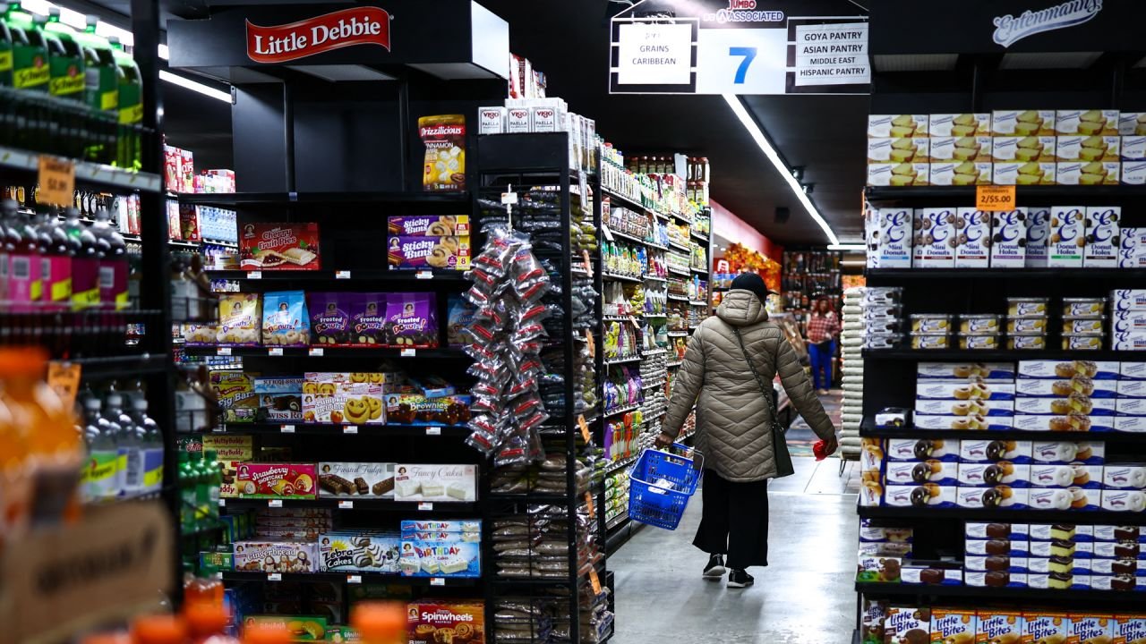 A customer walks down the aisle in a supermarket in the Sugar Hill neighborhood of Manhattan in New York on September 28, 2026. (Photo by CHARLY TRIBALLEAU / AFP via Getty Images)