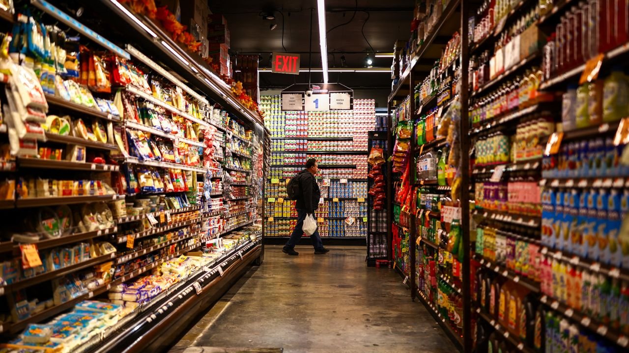 A customer shops in a supermarket in the Sugar Hill neighborhood of Manhattan in New York on September 28, 2026.