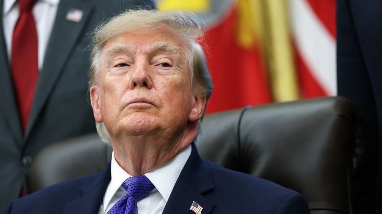 U.S. President Donald Trump listens to a reporters question in the Oval Office at the White House on September 28, 2026 in Washington, DC.