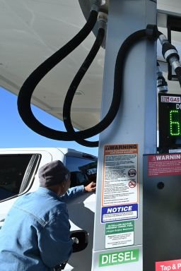 David Rotundo of Blue Mountain Lake fills his pickup truck with gasoline on October 6, 2026, in Rotterdam, New York.
