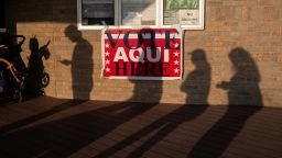 People wait in line to cast their ballots in the Texas primary election at a polling place in Austin, Texas, on March 3, 2026. Four longtime Latino civil rights and political organizations are joining efforts to register voters and mobilize Hispanic Democrats in the wake of rising voting restrictions.