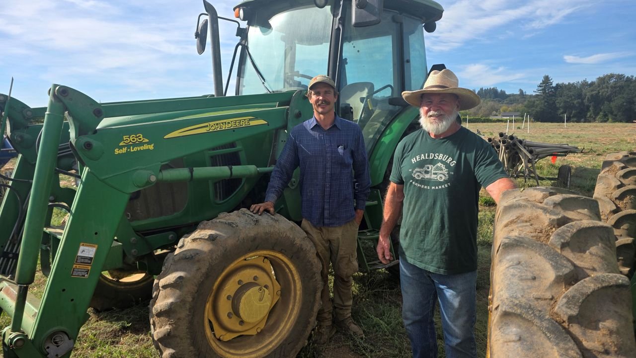 Sammy Tookey, left, and his stepfather, George Kibby, grow vegetables and fruits in northern California.